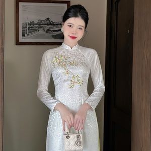 Ivory white Vietnamese traditional Ao Dai long dress embroidery, including pants